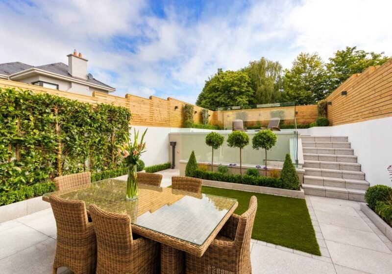 Private garden terrace with outdoor dining set